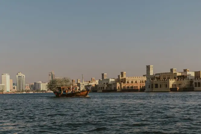 Traditional abra boat crossing Dubai Creek