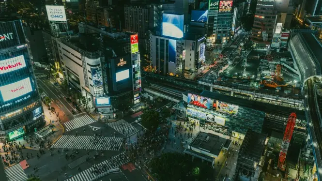 High angle view of crowds crossing the famous Shibuya Crossing in Tokyo