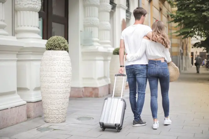 A traveller walking through Florence streets without heavy bags