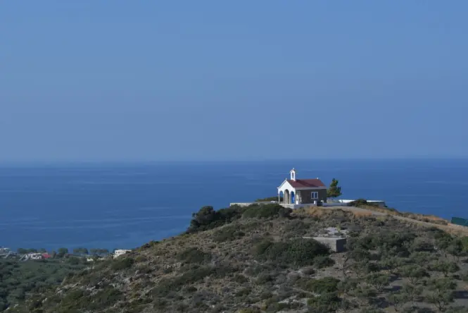Small whitewashed chapel along the walking path through Anafiotika