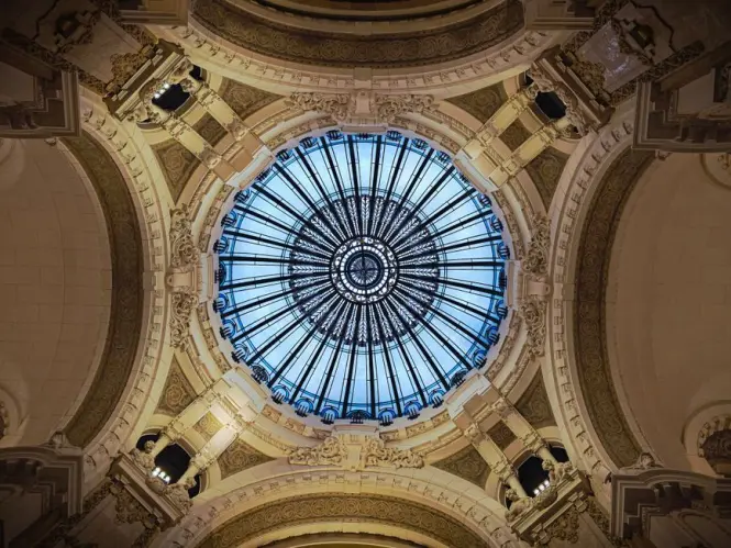 Historic interior of Cafe Tortoni with stained glass ceiling on Avenida de Mayo