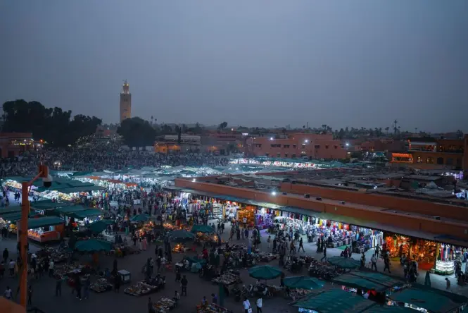 Busy market street between Jemaa el-Fnaa and the Kasbah district