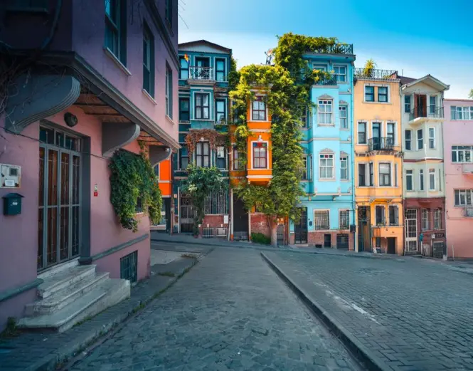 Painted houses in Balat lit by soft early morning light
