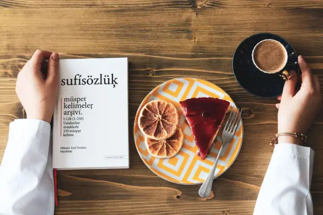 Melange coffee and Sachertorte slice served at a Vienna café table