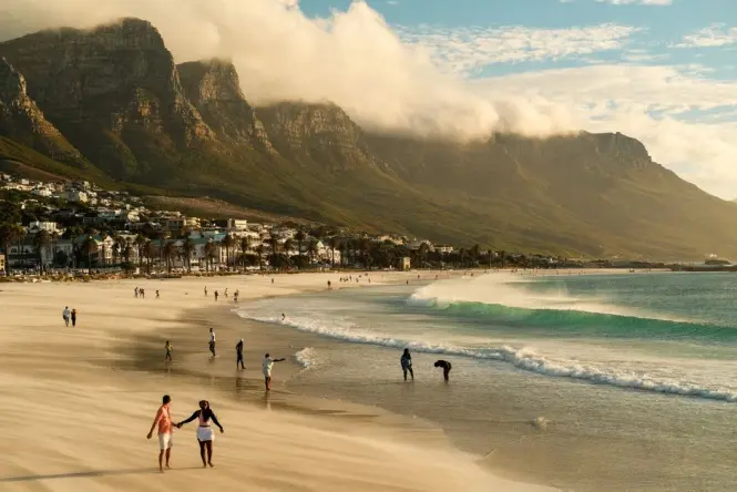 Sunset over the mountains as seen from Camps Bay Beach