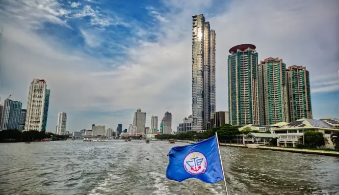 Dinner cruise deck with buffet setup on the Chao Phraya