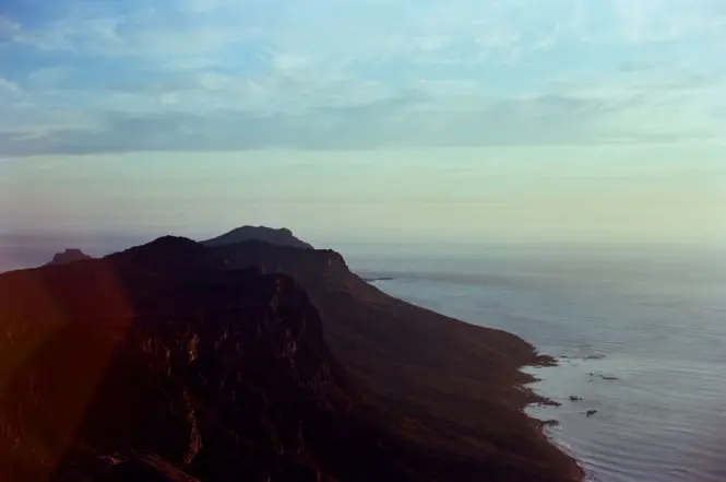 Sunset light on Chapman's Peak Drive cliffs