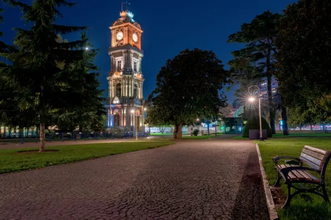 The neo-Baroque clock tower standing near Dolmabahce Palace's Treasury Gate