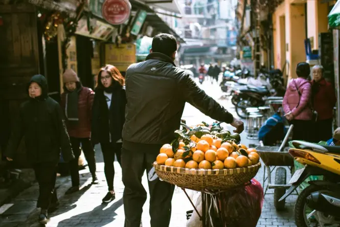 Early morning shoppers at Dong Xuan Market Hanoi