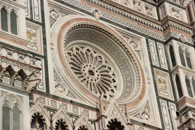 Detailed look at the bronze doors and security gate at Florence Cathedral
