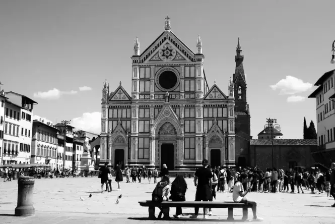 Long line of visitors queuing in Piazza del Duomo