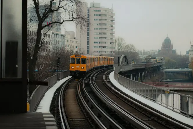 S-Bahn train arriving at the elevated Hackescher Markt station
