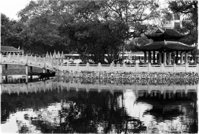 Stone bridge connecting the two lakes inside Hanoi Botanical Garden