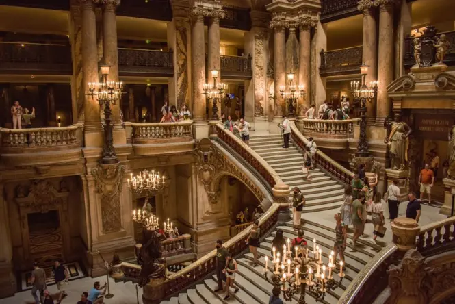 Grand marble staircase inside Hanoi Opera House leading to the upper balcony