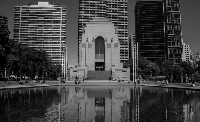 ANZAC Memorial sandstone building beside its reflection pool