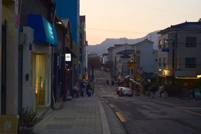 Traditional hanok houses along a residential street in Bukchon
