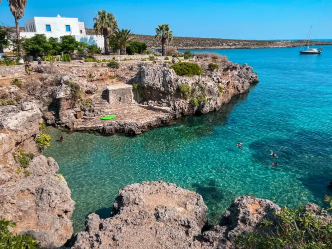 Rocky swimming cove with clear water on Île Sainte-Marguerite