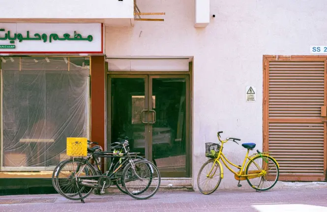 Public parking area along Jumeirah Beach Road near the shoreline