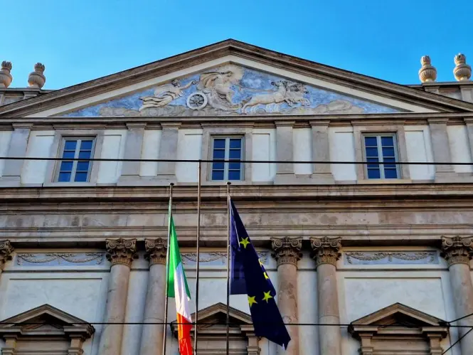 People queueing near the ticket office of Teatro alla Scala in Milan