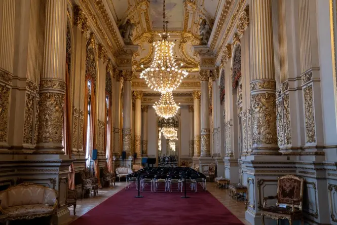 Close-up of the red velvet and gold-trimmed private boxes inside Teatro alla Scala