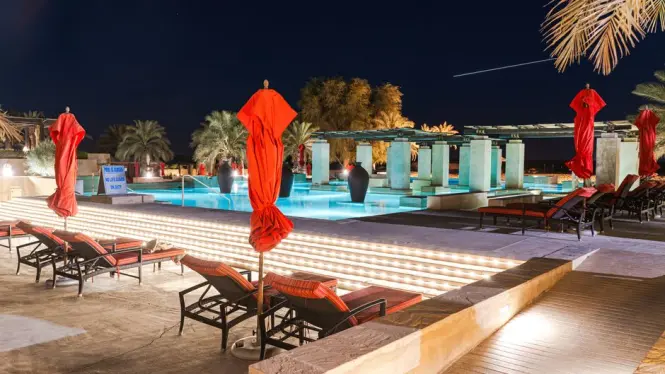 Madinat Jumeirah's wind towers and courtyards lit up at night