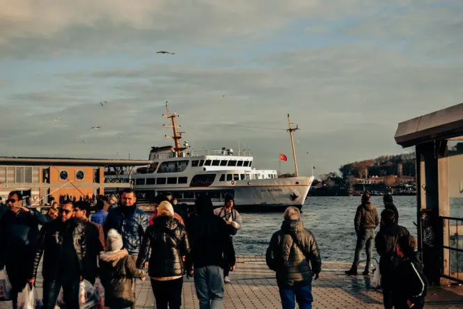 Small ferry departing the Uskudar pier toward Maiden's Tower