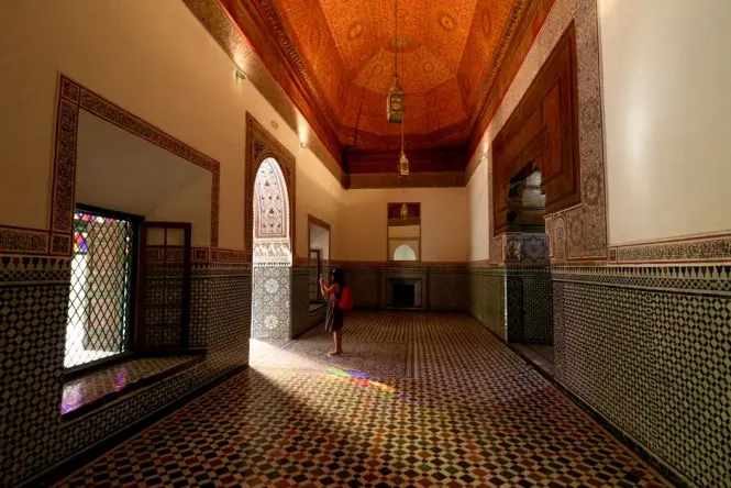 Interior prayer hall of the Lazama Synagogue with traditional tilework in Mellah