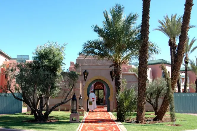Entrance gate and ticket booth path at Menara Gardens Marrakech