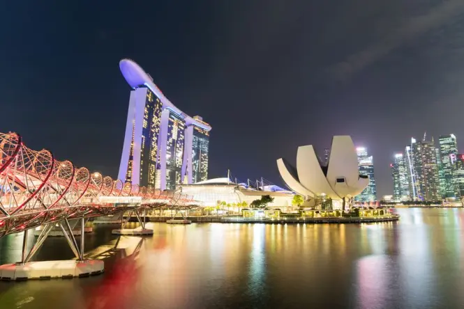The Helix Bridge illuminated near Marina Bay