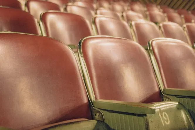 Audience seated for an evening opera performance