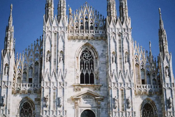Close up of the security checkpoint and signs at Milan Cathedral entrance