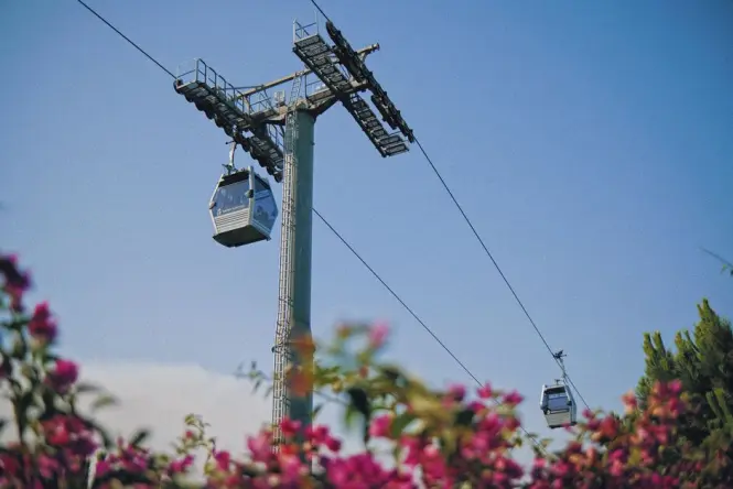 Cable car cabin suspended over Barcelona harbour