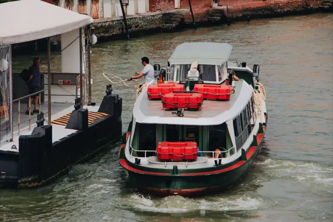 A water bus navigating the Venetian lagoon