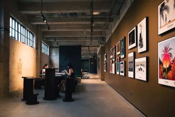 Visitors enjoying coffee in a clean, contemporary museum cafeteria
