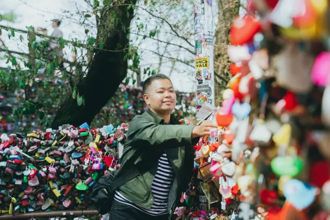 Fence covered in padlocks left by couples near N Seoul Tower