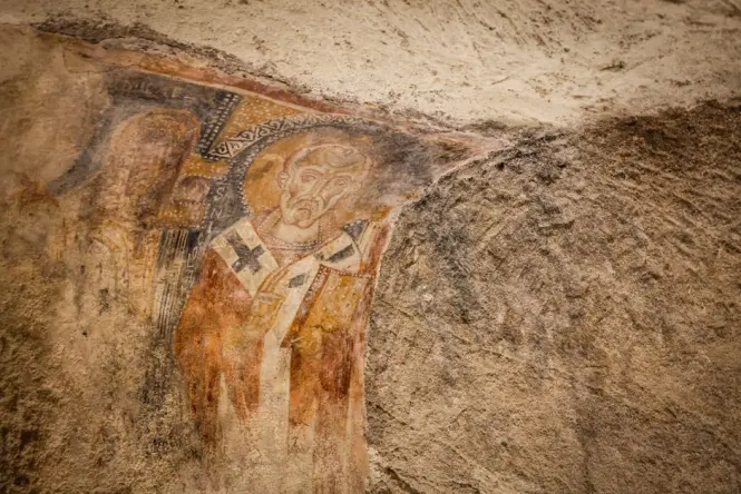Ancient fresco from Akrotiri Santorini displayed in a museum