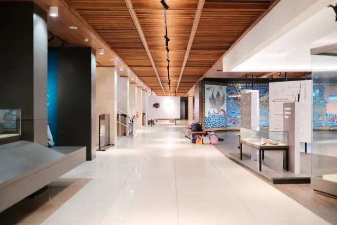 Quiet gallery corridor with artwork during a weekday morning visit