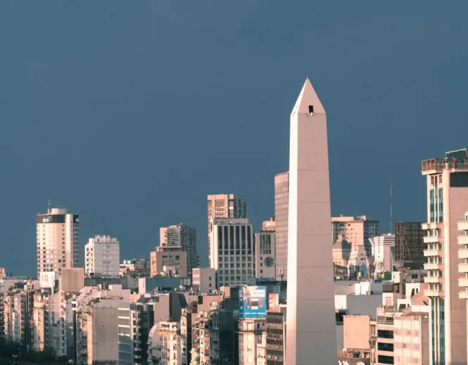 Sunset light on the Obelisk of Buenos Aires spire against the sky