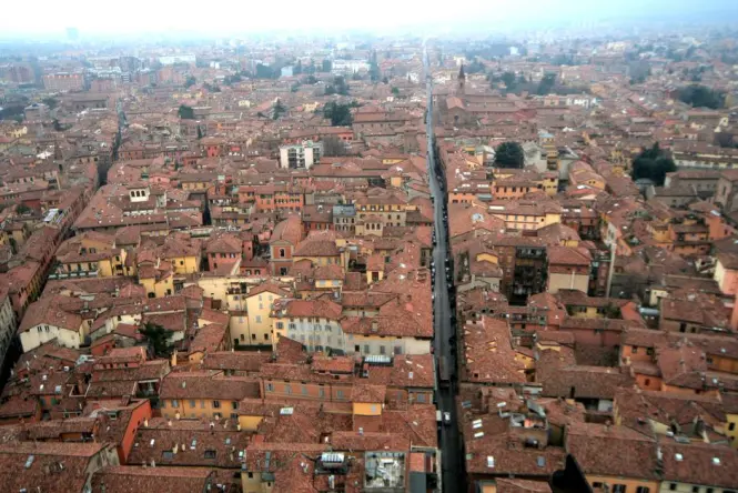 Panoramic views of Bologna's red rooftops from the Torre dell Orologio