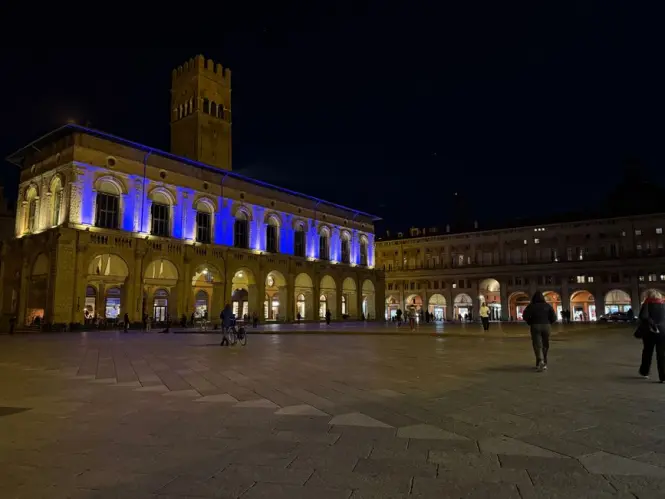 The historic facade of Palazzo del Podesta on Piazza Maggiore