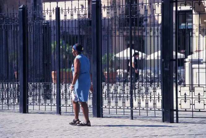 The protective iron gates surrounding the monumental fountain of Piazza Pretoria