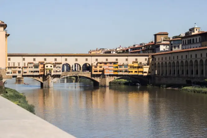 An empty Ponte Vecchio bridge in the quiet morning light