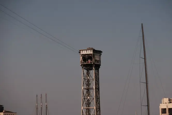 Golden hour light on Port Vell harbour water