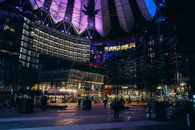 Visitors walking through the Sony Center plaza at Potsdamer Platz