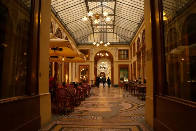 A traditional historic wooden cafe interior in Turin serving coffee