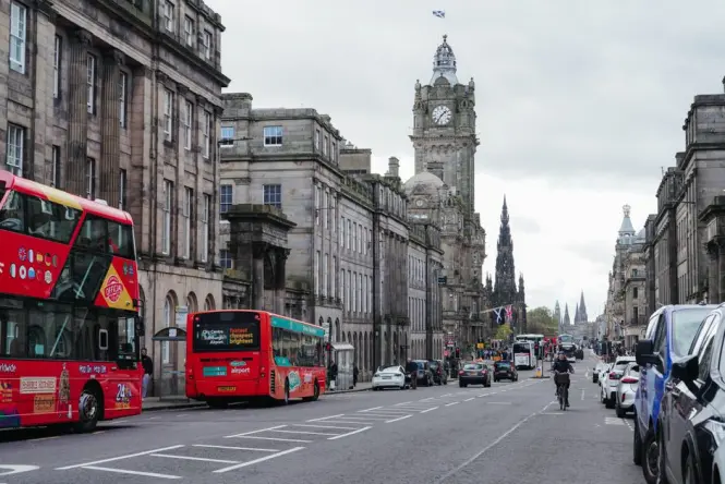 A quiet winter morning on Princes Street near Scott Monument with few visitors