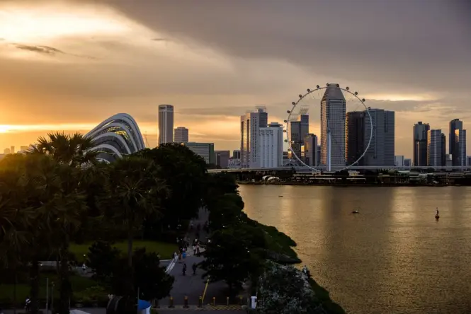 Sunset view of Marina Bay skyline from an observation wheel capsule