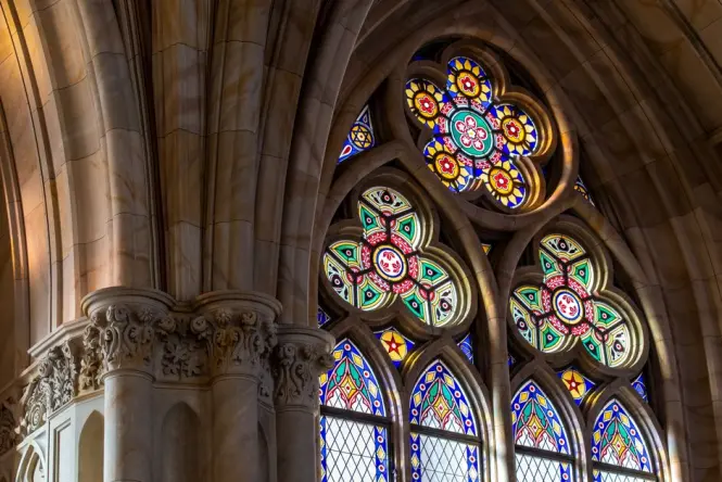 Stained glass window inside St. Joseph's Cathedral nave