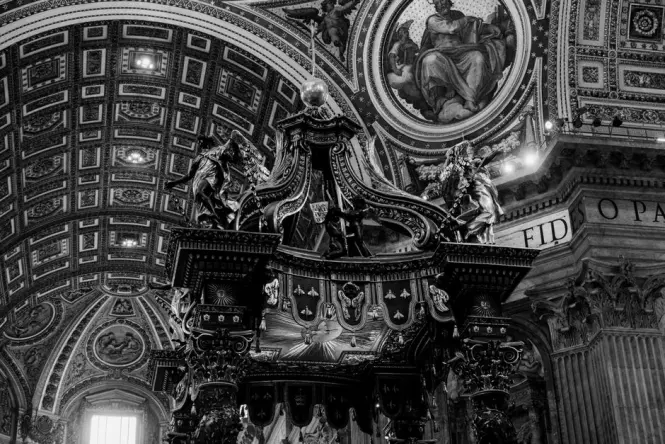 Bernini's bronze baldachin beneath Michelangelo's dome inside St. Peter's Basilica