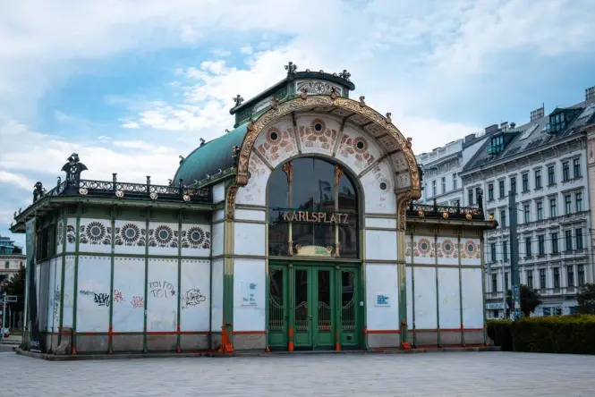 Otto Wagner Stadtpark station pavilion with green ironwork and gold trim
